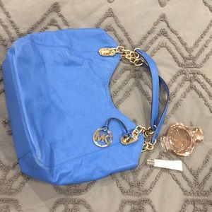 Michael Kors blue purse with gold chain